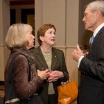 Attendees interact with one another